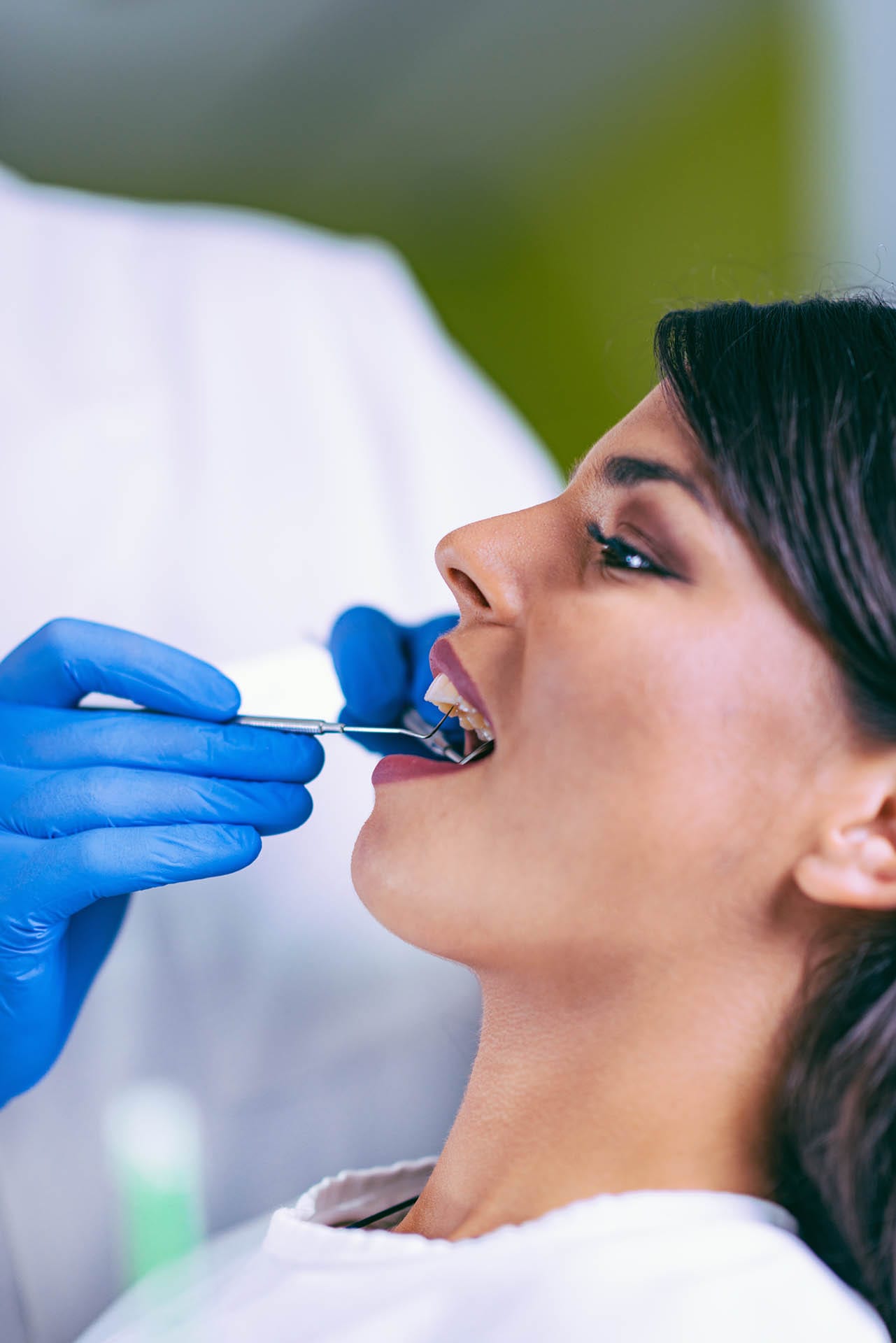 patient receiving dental exam at Digiorno Dental Fitness