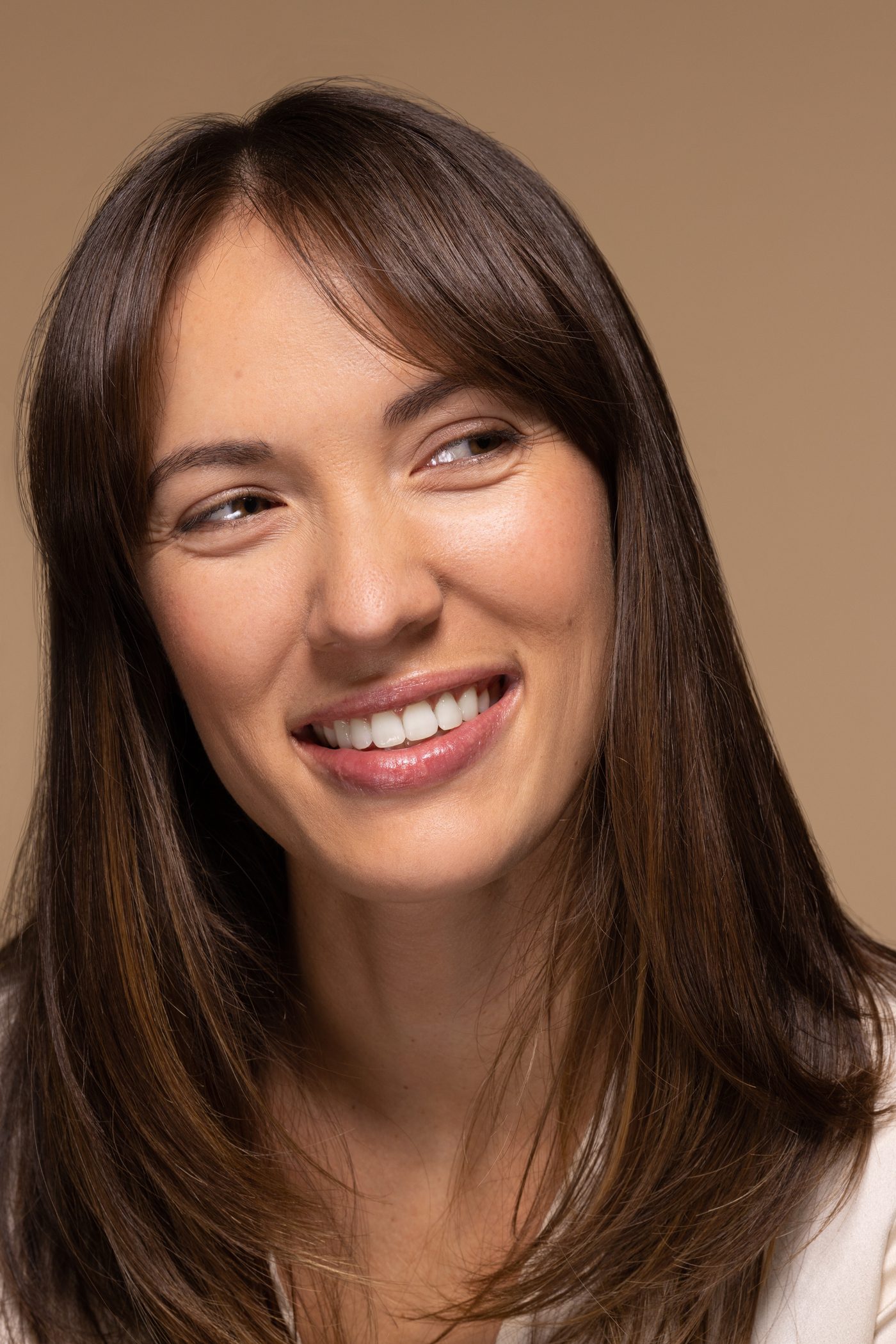 Woman with beautiful smile after dental contouring and teeth bonding